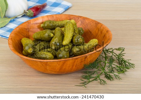 Pickled small cucumber with dill and spices