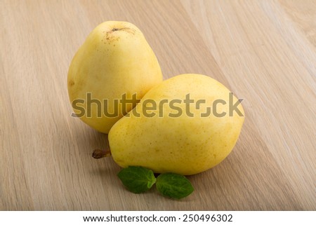 Bright ripe Yellow pears with mint leaves