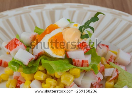 Crab sticks salad with egg and corn
