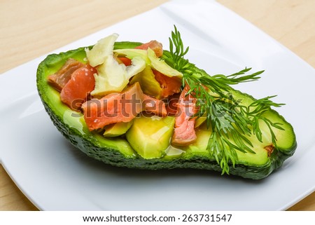 Salmon and avocado salad with dill and sesame seeds