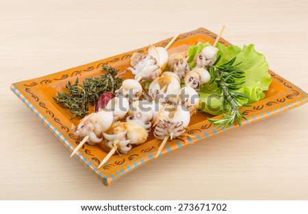 Grilled cuttlefish bbq with rosemary and pepper