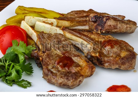 Grilled Lamb chops with eggplant and coriander leaves