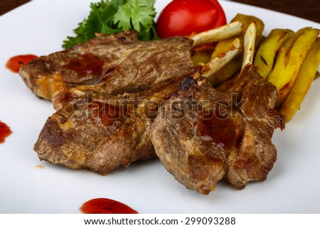 Grilled Lamb chops with eggplant and coriander leaves