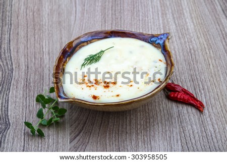 Cheese soup with dill, bacon, spices and herbs