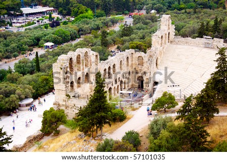 ncient theatre of Herodes Atticus is a small building of ancient Greece used for public performances of music and poetry, below on the Acropolis and in background dwelling of metropolis Athens
