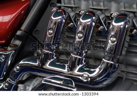 Exhaust. Exhaust of a motorbike. Motorcycle engine. Gear.