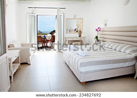 hotel room with bed and view sea a