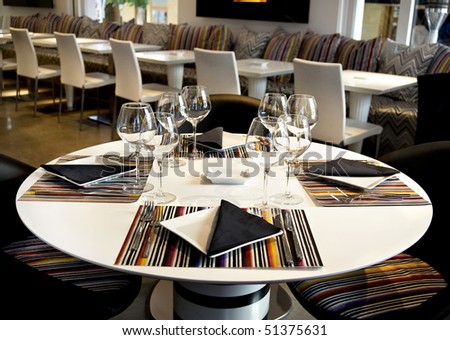 modern and color dinner table with dinnerware set