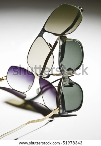modern sun glasses composition on white background