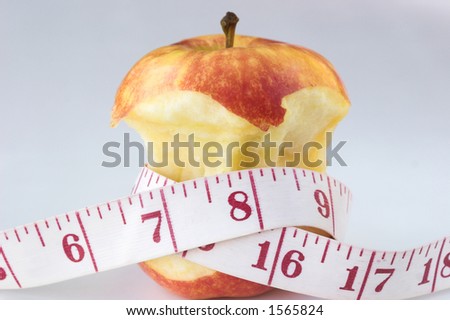 Apple core and tape measure