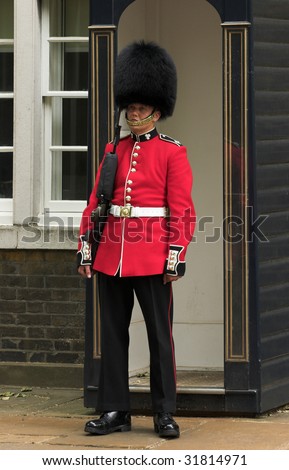 LONDON - JUNE 06: A Royal Guard at Stable Yard Road on 06 June 2009 in London, England.