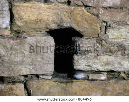 Hole in the wall - great for a website with the black space. \'Enter Here\'...?
