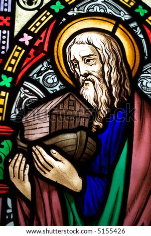 detail of victorian stained glass church window in Fringford depicting Noah with the ark in his arms