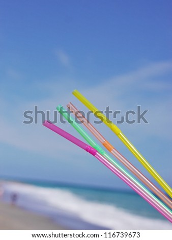 drinking straws beach drink outside at ocean