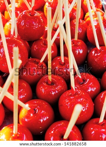 Delicious glazed apples on sticks candy apple