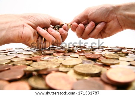 grabbing all the money, hands grabbing coins isolated/white background