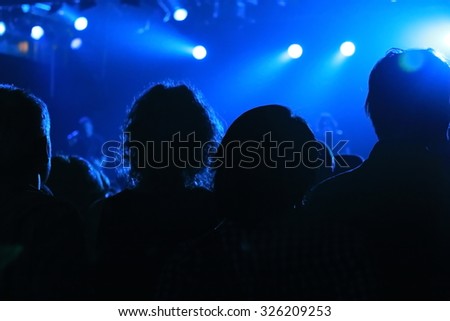 Close up of crowd enjoying the concert in one of the rock show