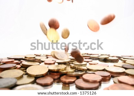 falling money, the falling coins are motion-blurred! lots of coins symbolize money rain