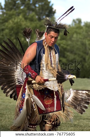 OTTAWA, CANADA - JUNE 16: Unidentified indian dances in full dress during the Powwow festival at Dows lake in Ottawa Canada on  June 16, 2007.