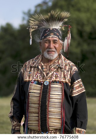 OTTAWA, CANADA - JUNE 16: Unidentified elder indian in full dress during the Powwow festival at Dows lake in Ottawa Canada on  June 16, 2007.