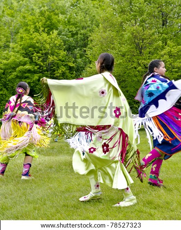 OTTAWA, CANADA - MAY 28: Unidentified aboriginal women dancers in full dress regalia during the Powwow festival at Ottawa Municipal Campground in Ottawa Canada on May 28, 2011.