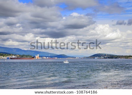 Vancouver Sea landscape against expressive cloudy sky. British Columbia,Canada