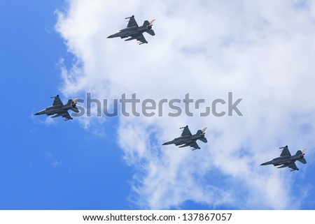 TEL-AVIV, ISRAEL - APRIL 16: Armed fighter jets flying on festive parade of Israel army of defense during Independence Day celebration on April 16, 2013 in Tel-Aviv, Israel
