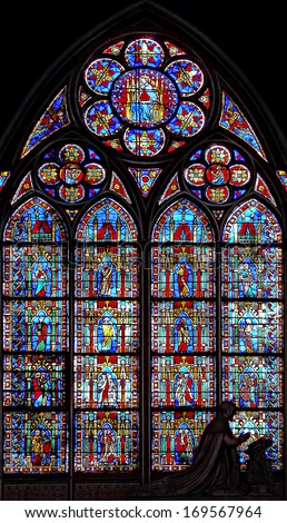 PARIS - DECEMBER 18: Famous Notre Dame cathedral stained glass. Its main theme is the Old Testament. UNESCO World Heritage Site. Paris, France, December 18, 2012
