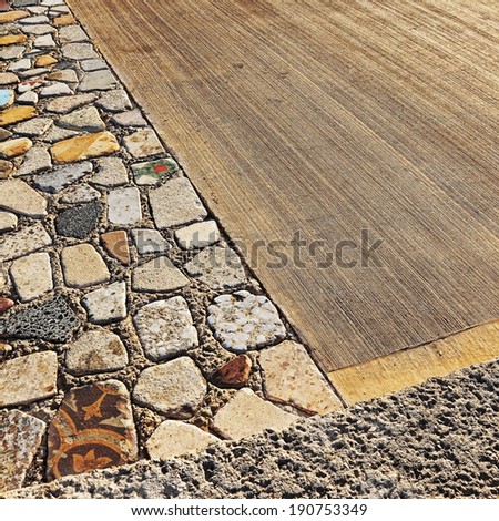Different paving stone materials road texture background
