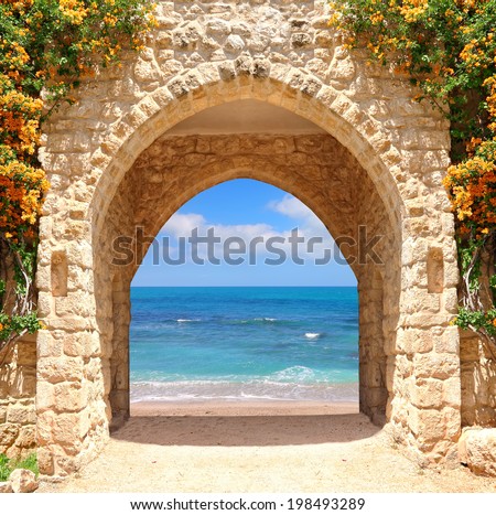 Ancient stone arch to the sea