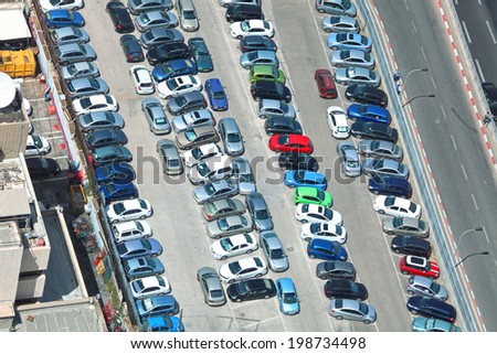 TEL-AVIV, ISRAEL - MAY 22 : Aerial view of full cars city parking on May 22, 2014 in Tel Aviv, Israel. The government has promoted park and ride to reduce traffic congestion