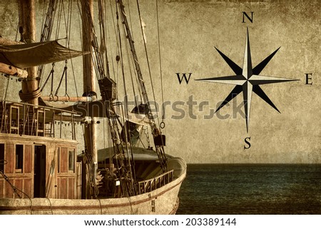 Textured old paper background with sailing ship floating by the sea and wind rose