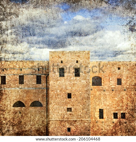 Textured grunge paper background style with Middle East old prison.Akko (Acre),Israel