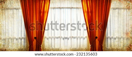 Window with curtains and frosty pattern on winter glass morning light background