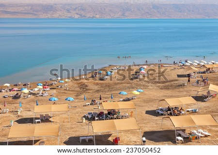 DEAD SEA RESORT.ISRAEL- NOVEMBER,07: Dead sea resort public beach. Dead Sea health tourism spot is 427 metres below sea level - Earth\'s lowest elevation on land. Israel,on November ,07, 2014