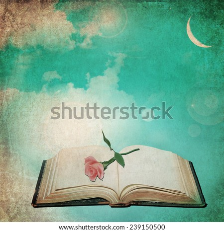 Textured old paper background with open book and rose flower at moon sky light. Vintage abstract background