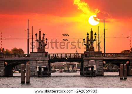 Amsterdam canal bridge at sunset. Netherlands,Europe