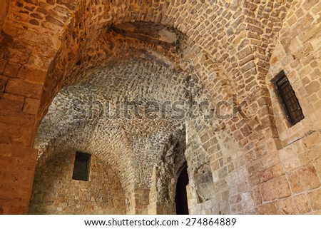 Templar fortress(12 th century) in ancient Acre, Israel. Famous tourist and historical sight. Ancient Acre is UNESCO World Heritage. Mediterranean
