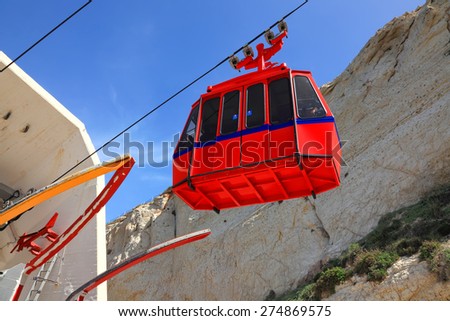 Cable way from cliff top to the foot in Rosh Hanikra - Popular tourist site of sea grottoes and last point of the Israel sea border and Lebanon. Mediterranean, Israel