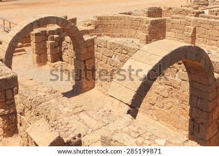 Ancient stone arches of the old city of Caesarea, Mediterranean sea. Caesarea. Israel