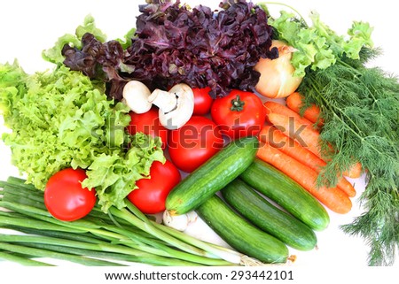 Fresh healthy vegetables on a white background
