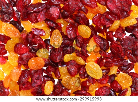 Raisin and cranberry mixed dried fruits background. The healthy vitaminized food (snack)