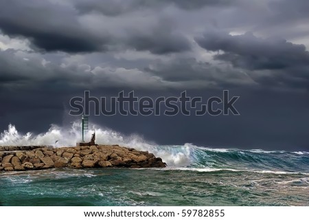Storm, pier and small beacon