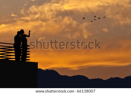 people silhouettes standing. people silhouettes standing. of two people standing on