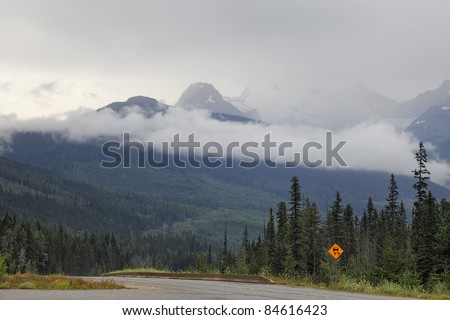 Fog on road through mountain pass (British Columbia. Canada)