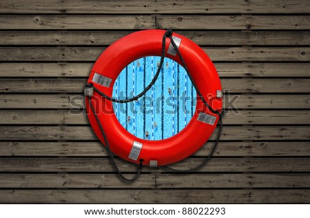 Top view on swimming pool through a red life buoy on a wooden wall