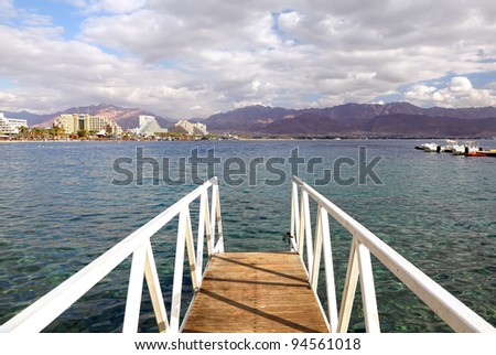 Mooring for boats and general view to Eilat city and Jordan mountains (Red sea. Israel)