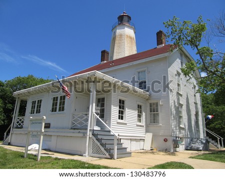 Sandy Hook Light Keeper\'s Residence (1883) and Lighthouse (1764). The lighthouse is the oldest working in the US today. The lighthouse is located within Gateway National Recreation Area in New Jersey