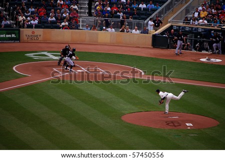 MINNEAPOLIS - JULY 17:  Carl Pavano of the Twins pitches the ball just a bit outside to Juan Pierre of the Chicago White Sox in a game at Target Field July 17, 2010 in Minneapolis, MN.