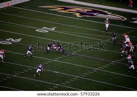 BALTIMORE - SEPTEMBER 21: Kellen Winslow Jr. of the Cleveland Browns can not hold on to the ball as he is tackled by two players from the Baltimore Ravens September 21, 2008 in Baltimore, MD